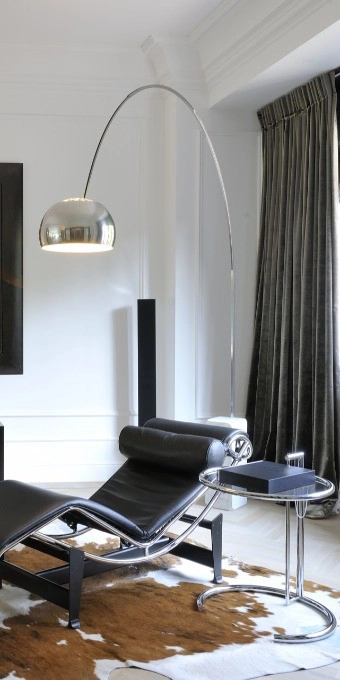 Orac Decor C336 Coving in a modern living room corner above a black leather chaise lounge