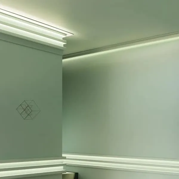 Orac C383 Coving in a modern interior corner with LED strip lighting