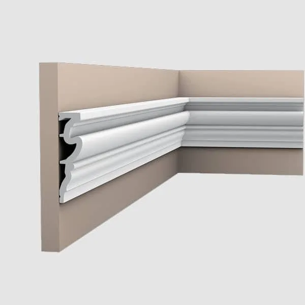 Orac DX170 coving on a beige wall corner with white decorative moulding and ceiling detail
