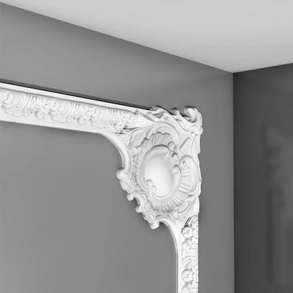 Orac P3020A ornate white panel moulding corner on a grey wall