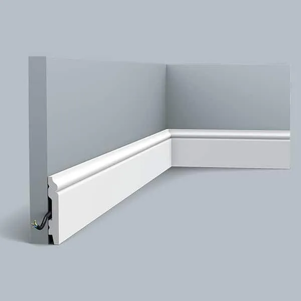 Orac SX165 white skirting board on gray wall corner