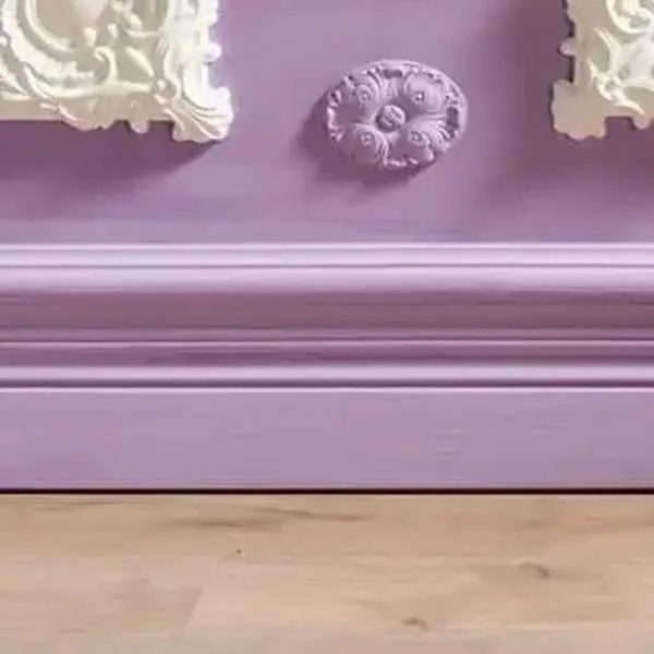 Orac SX165 panel moulding close-up with purple paint and intricate white ornamental details