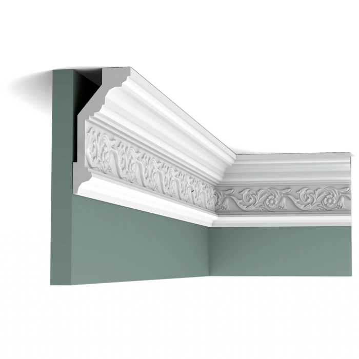 Orac Decor C303 Coving with floral detail in a green wall corner