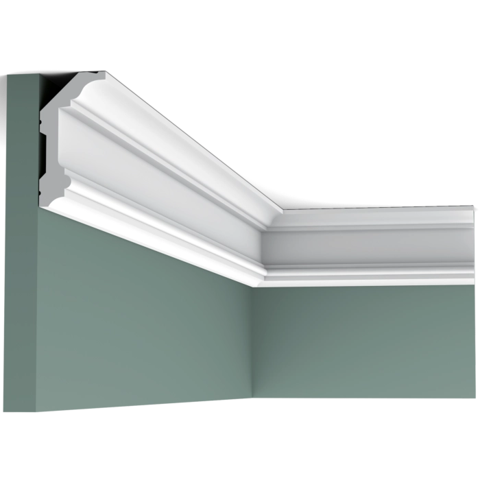 Orac Decor C321 Coving in a room corner on a green wall with ceiling visible