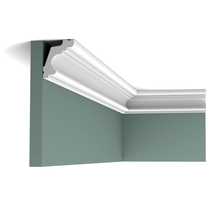 Orac Decor C322 Coving in room corner with white decorative molding on green walls