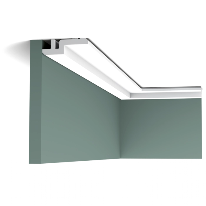 Orac Decor C394 Coving in a room corner with ceiling detail on a green wall