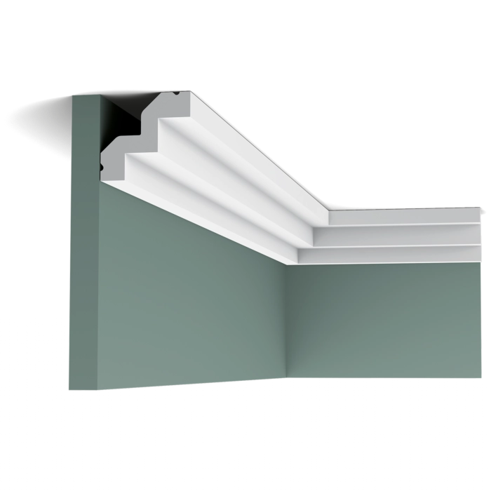Orac Decor C602 coving on green walls at the ceiling corner