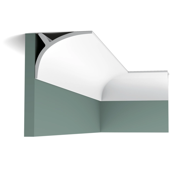 Modern minimalist bed with green upholstered base and white bedding, Orac Decor C991 coving visible in corner on ceiling