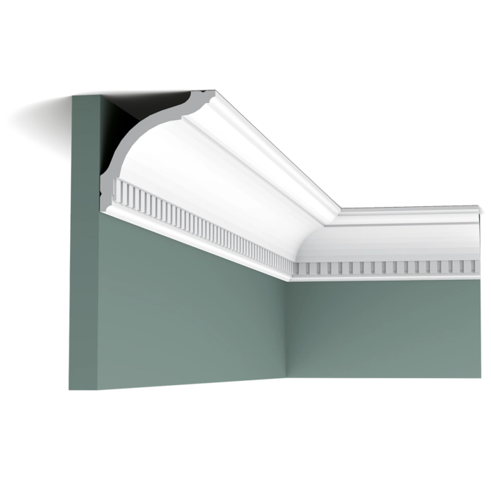 Orac CX129 coving installed in a green wall corner