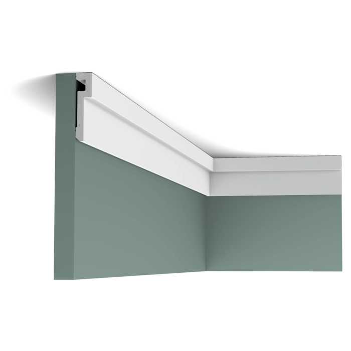 Orac Decor PX198 coving on green walls with white ceiling cornice molding in a corner view