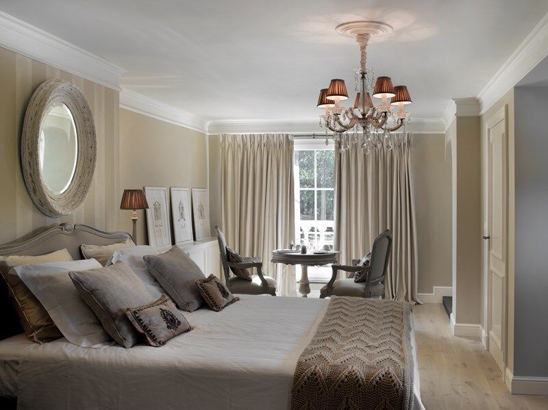 NMC 02 001425 Coving in an elegant bedroom corner with chandelier and neutral decor