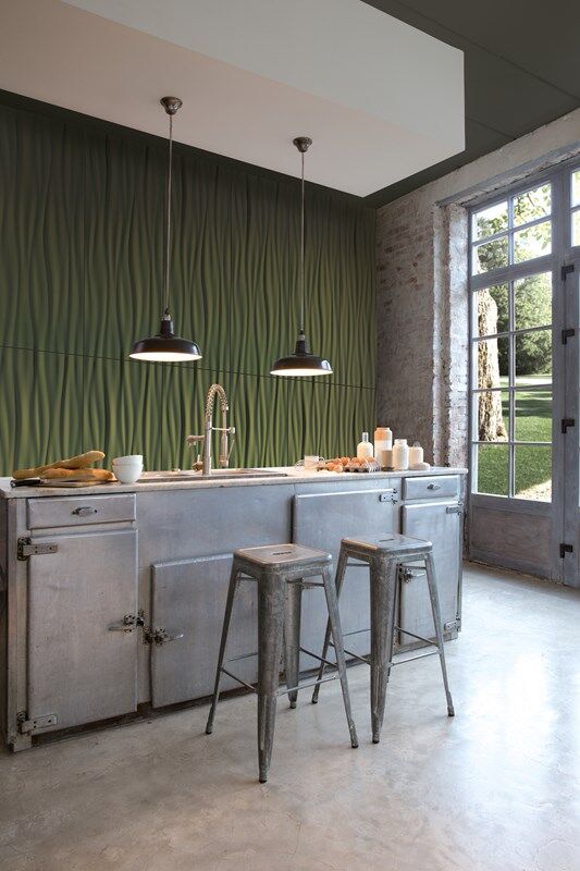 NMC 02 001508 panel moulding in a modern industrial kitchen corner with green textured wall and metal cabinetry