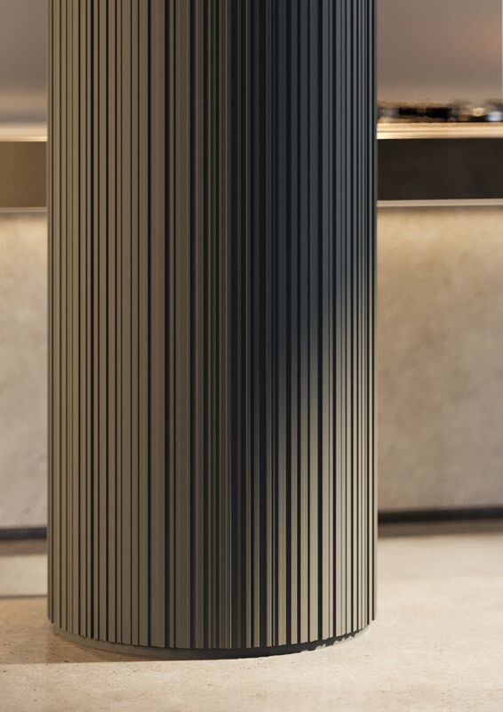 NMC 02 005183 black slatted cylindrical column in a contemporary interior