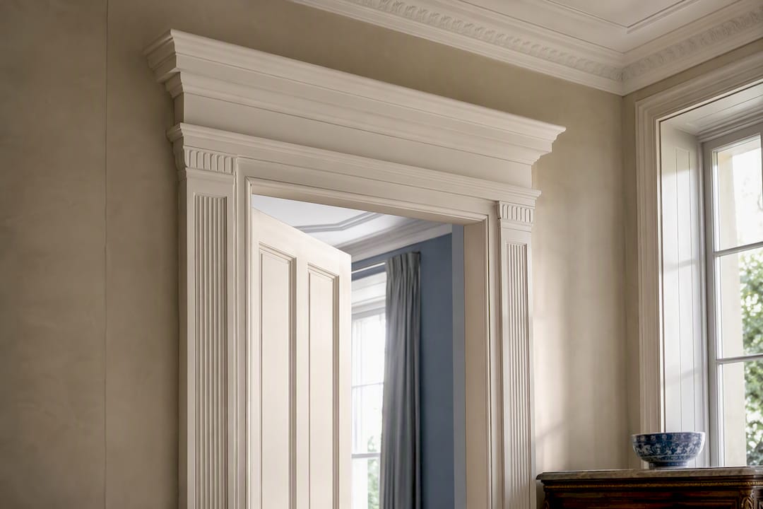 Classical pilaster and pediment above doorway