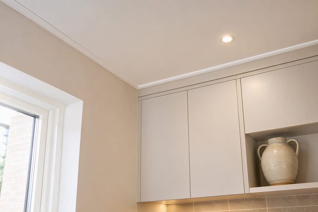 Coving detail in a bright new-build kitchen